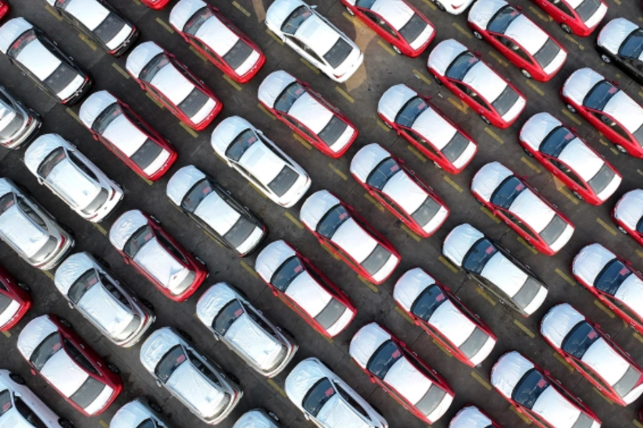Export-bound vehicles wait to be loaded onto roll-on/roll-off ships at Lianyungang Port in China, on December 1, 2025.