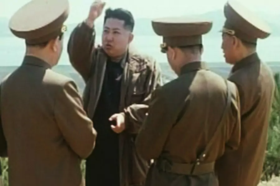 New leader of North Korea Kim Jong-un speaks while surrounded by soldiers in this undated still image taken from video at an unknown location in North Korea released by North Korean state TV KRT on January 8, 2012.