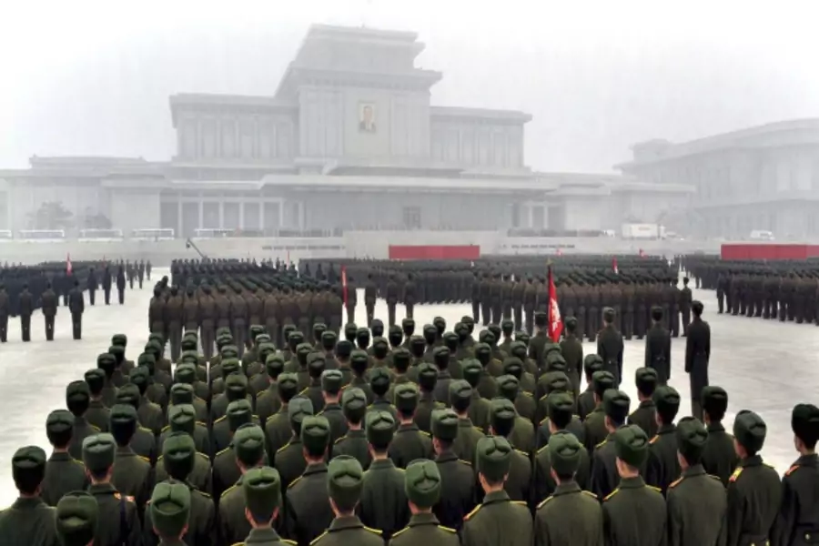 Soldiers of the three services of the Korean People's Army attend a rally at the plaza of the Kumsusan Memorial Palace in Pyongyang in January 2012 (Courtesy Reuters/KCNA KCNA).