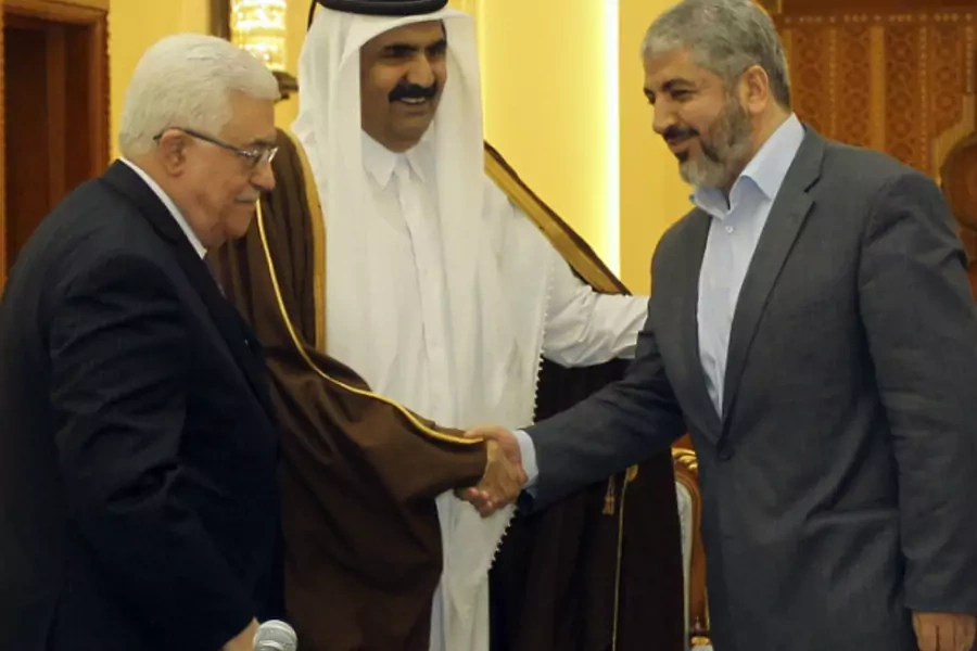 Palestinian President Mahmoud Abbas, Qatar's Emir Sheikh Hamad bin Khalifa al-Thani and Hamas leader Khaled Meshaal (L-R) talk...independent technocrats for the West Bank and Gaza, headed by Palestinian President Mahmoud Abbas. (Courtesy REUTERS/Stringer)