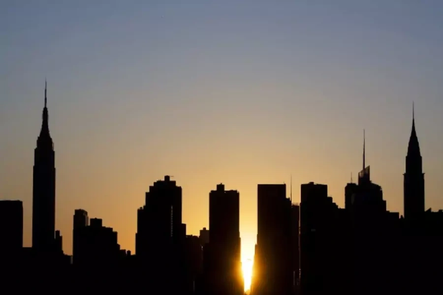 The sun sets over the city in a phenomenon known as "Manhattanhenge" in New York in 2009 (Courtesy Reuters/Lucas Jackson).
