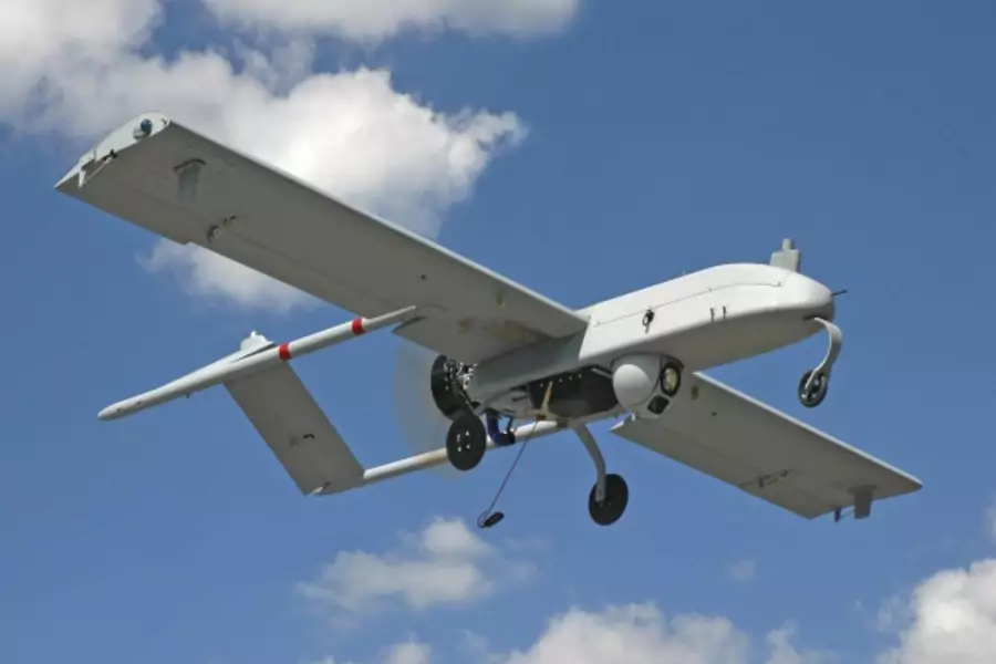 An unarmed U.S. "Shadow" drone is pictured in flight (Courtesy Reuters).