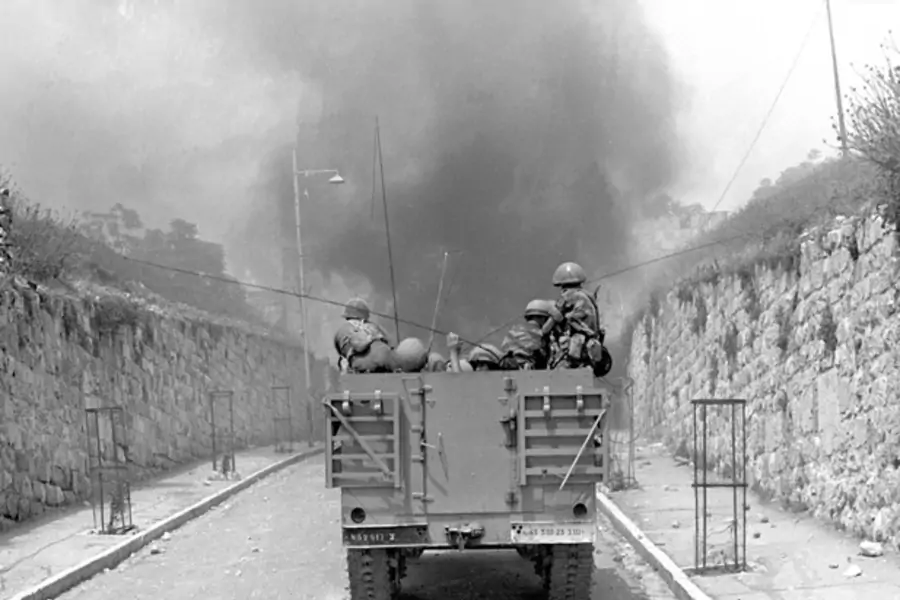 An Israeli armoured vehicle drives towards the Lion's Gate in the Old City of Jerusalem during the Six Day War in 1967 (Courtesy Reuters).