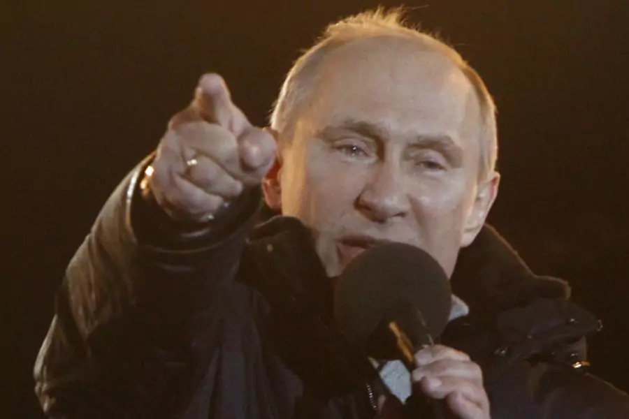 Russia's current Prime Minister and president-elect Vladimir Putin has tears in his eyes as he addresses supporters. (Mikhail Voskresenskiy/courtesy Reuters)