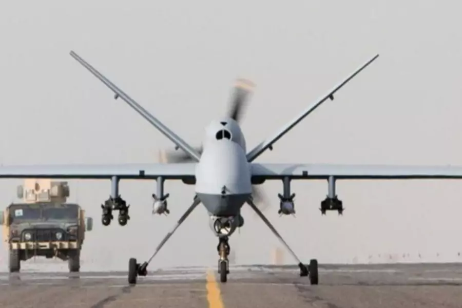 An armed Reaper drone prepares for takeoff in Afghanistan.