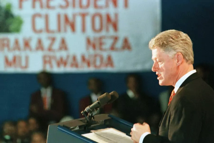 President Clinton speaks to survivors of the 1994 Rwandan genocide at the Kigali airport on March 25, 1998. (Win McNamee/courtesy Reuters)