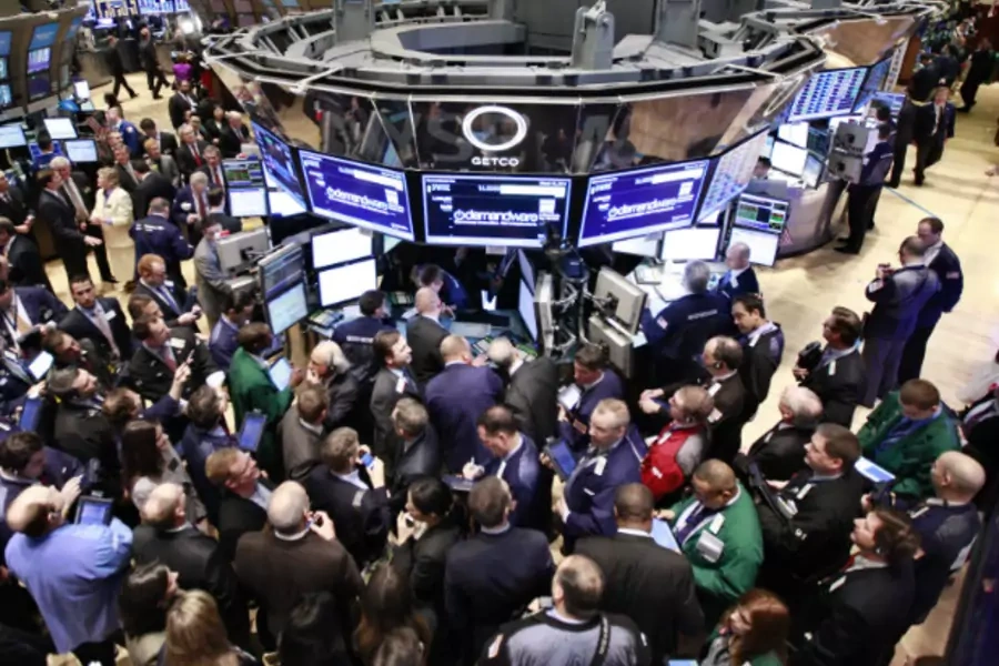 Traders gather on the floor of the New York Stock Exchange for Demandware’s IPO on March 15, 2012. (Brendan McDermid/Courtesy Reuters)