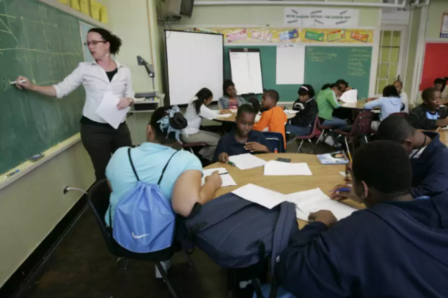 Teacher Darcy McKinnon teaches math to her seventh grade class at Samuel J. Green Charter School in New Orleans February 22, 2006.(Lee Celano/Courtesy Reuters)