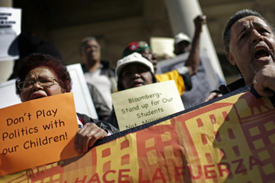 Parents and education advocates demonstrate on the steps of New York's City Hall for higher progressive taxes to close funding shortfalls in education. (Mike Segar/Courtesy Reuters)