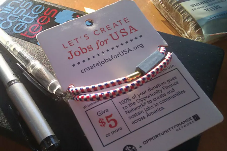 Starbucks "Create Jobs for USA" wristband. (seanmcmenemy/flickr)