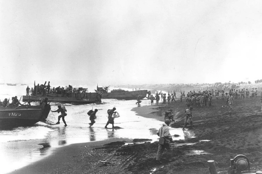U.S. soldiers unload landing craft during the Battle of Attu. (Naval Historical Center)