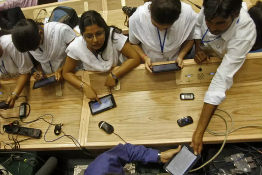 Students use Aakash, a low-cost tablet computer, in New Delhi, India on October 5, 2011 (Parivartan Sharma/Courtesy Reuters).