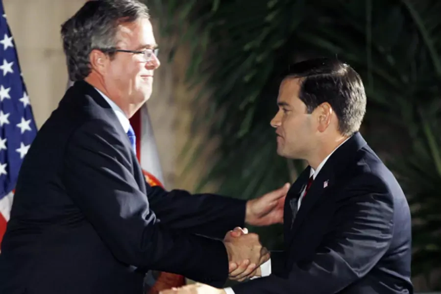 Former Florida governor Jeb Bush shakes hands with then-U.S. Republican Senate candidate Marco Rubio in Coral Gables, Florida in November 2010 (Hans Deryk/Courtesy Reuters).