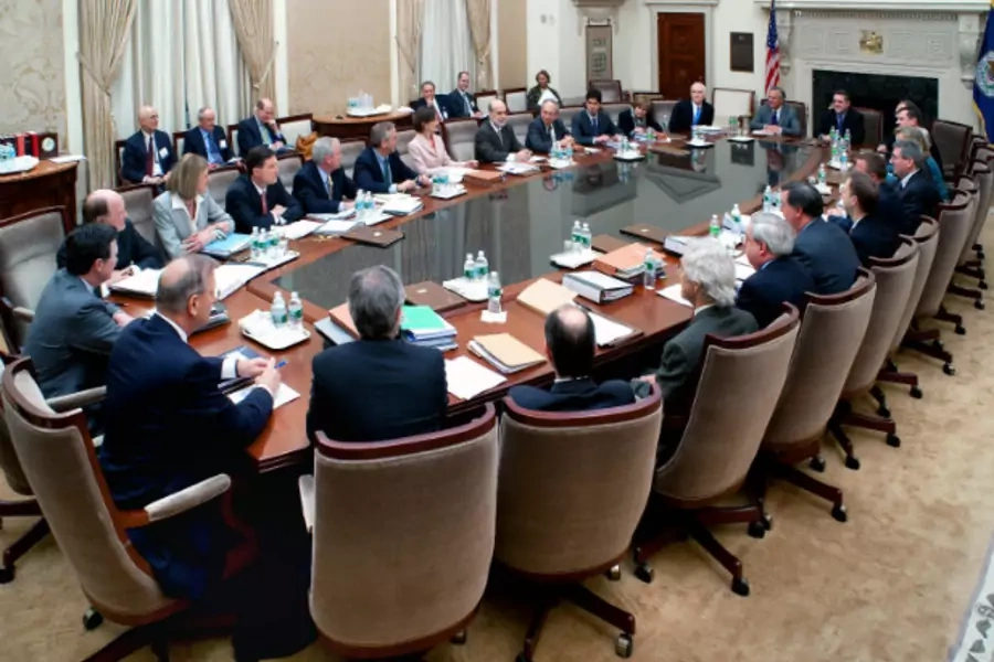 Chairman Ben Bernanke leads a meeting of the Federal Open Market Committee (FOMC)—the body that sets interest rate policy—in March 2009 (Handout/Courtesy Reuters).