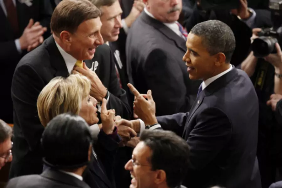 Pres. Obama speaks with Sen. Barbara Boxer (D-CA) and Rep. John Mica (R-FL), the chairmen of the transportation bill’s joint-chamber committee, before the 2011 State of the Union address (Jason Reed/Courtesy Reuters).