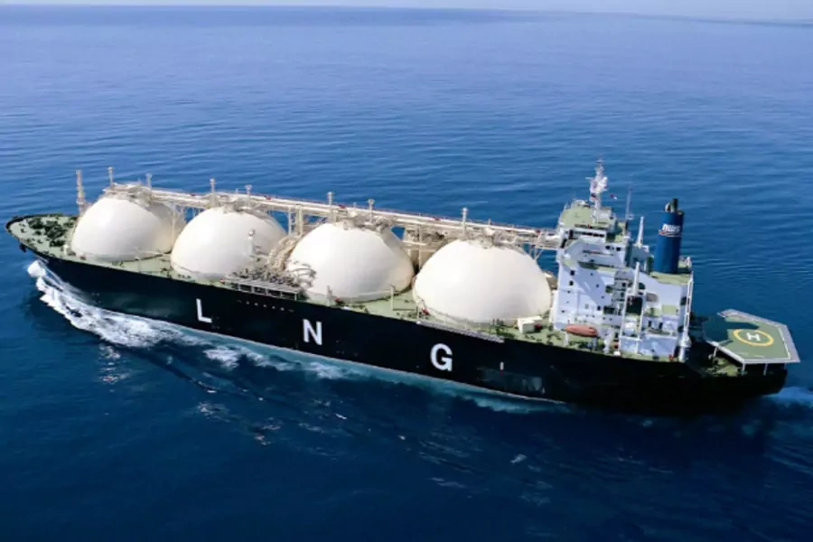 An Australian liquified natural gas (LNG) carrier, with four cyrogenic storage tanks that hold LNG, sails off the coast of Western Australia (Handout/Courtesy Reuters).