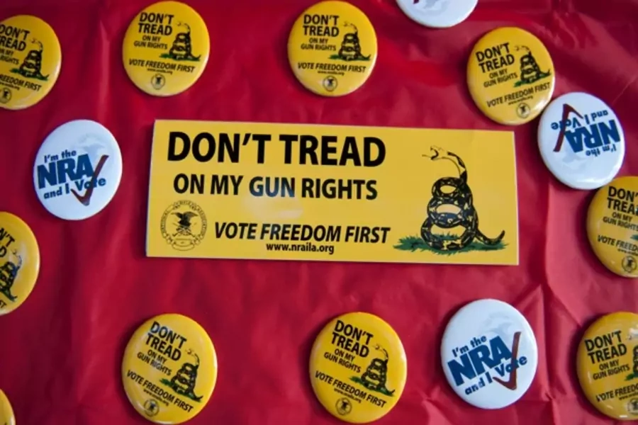 National Rifle Association promotional items are displayed at a campaign stop (David Acker/Courtesy Reuters).
