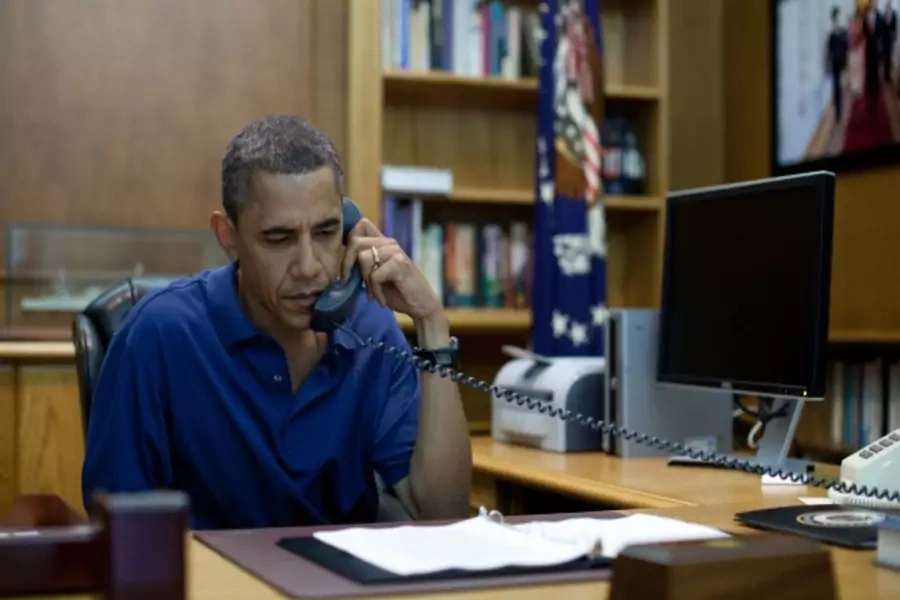 U.S. president Barack Obama holds a conference call from Camp David, Maryland (Handout/Courtesy Reuters).