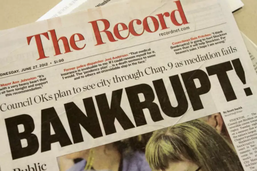 A local newspaper headline announces bankruptcy in Stockton, California on June 27, 2012 (Kevin Bartram/Courtesy Reuters).