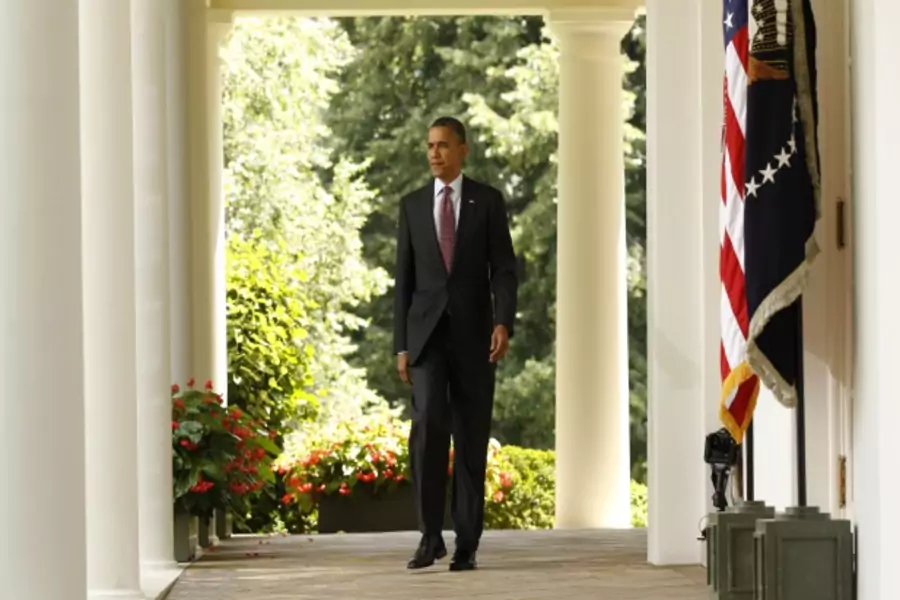 U.S. president Obama walks out of the Oval Office on June 15, 2012 (Kevin Lemarque/Courtesy Reuters).