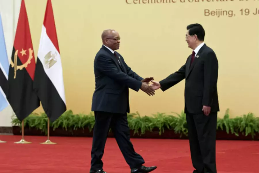South African President Jacob Zuma (L) shakes hands with his Chinese counterpart Hu Jintao before a group photo session for th...sterial Conference of the Forum on China-Africa Cooperation (FOCAC) in Beijing on July 19, 2012 (Andy Wongl/Courtesy Reuters).