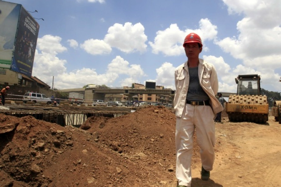 A Chinese contractor walks at the site of the Nairobi-Thika highway project, under construction near Kenya's capital Nairobi, on September 23, 2011.