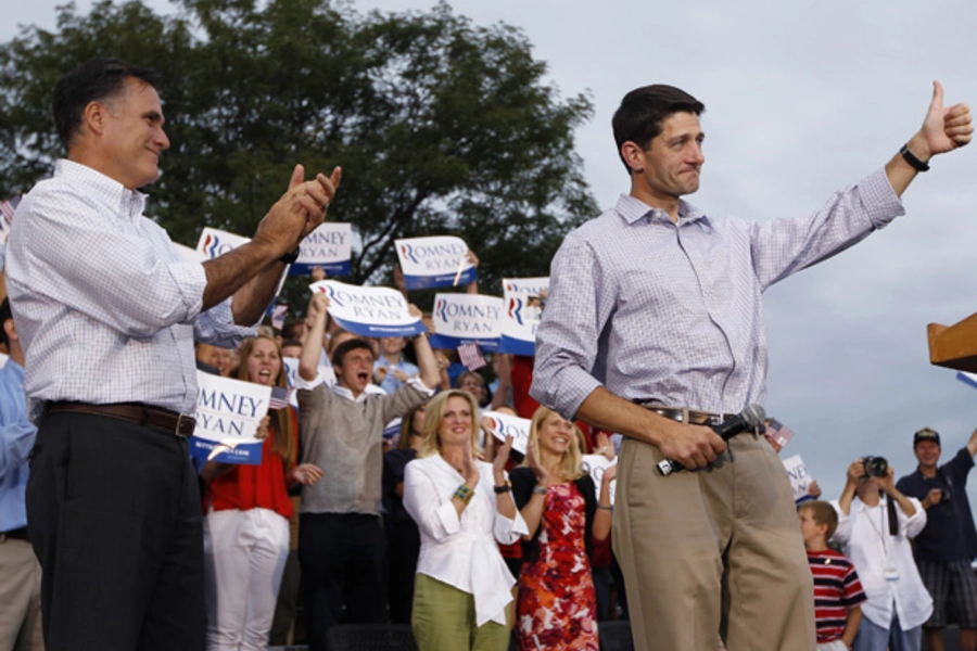 Mitt Romney claps as vice president select Paul Ryan (R-WI) gives the thumbs up to supporters during a campaign event in Wisconsin. (Shannon Stapleton/courtesy Reuters)