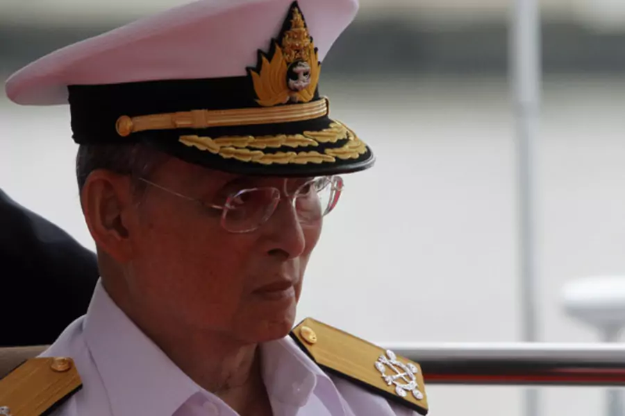 Thailand's King Bhumibol Adulyadej is pictured before taking a boat trip from Siriraj Hospital pier in Bangkok July 7, 2012.