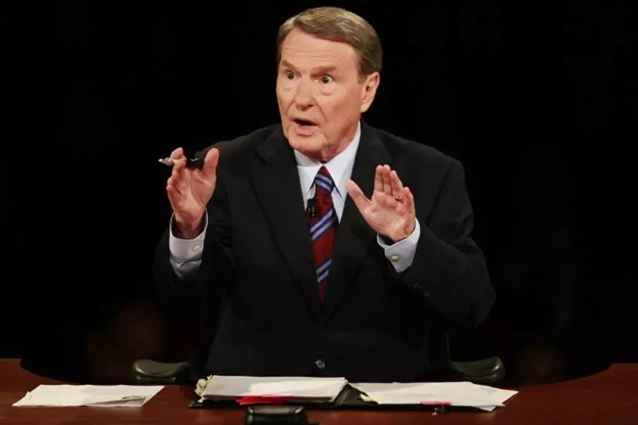 Jim Lehrer, seen here moderating the first 2008 presidential debate, will moderate next week's presidential debate at the University of Denver. (Chip Somodevilla/ courtesy Reuters)