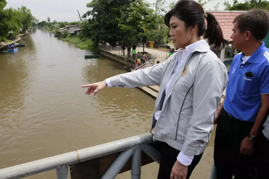 Thailand's prime minister Yingluck Shinawatra visits Sam Wa canal to check on the drainage system as the country prepares for rainy season in the suburb of Bangkok August 17, 2012.
