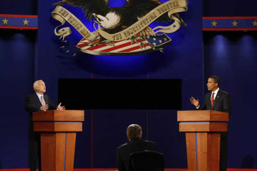 John McCain and Barack Obama debate foreign policy at the University of Mississippi in 2008. (Jim Bourg/ courtesy Reuters)