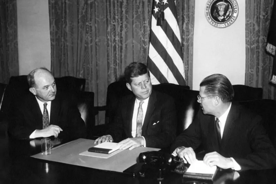 Secretary of State Dean Rusk, President John F. Kennedy, and Secretary of Defense Robert McNamara meet in the Cabinet Room in January 1961.(Abbie Rowe. White House Photographs. John F. Kennedy Presidential Library and Museum, Boston)