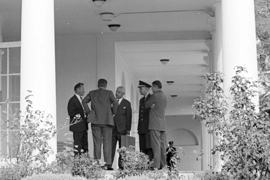 Members of the ExCom outside the Oval Office during the Cuban Missile Crisis. From left to right: Special Assistant to the Pre...fense Robert S. McNamara. (Cecil Stoughton. White House Photographs. John F. Kennedy Presidential Library and Museum, Boston).