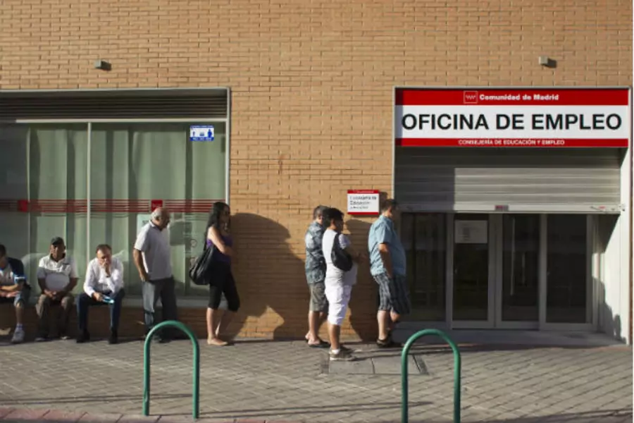 People queue to enter a government-run employment office in Madrid on July 27, 2012 (Juan Medina/Courtesy Reuters).