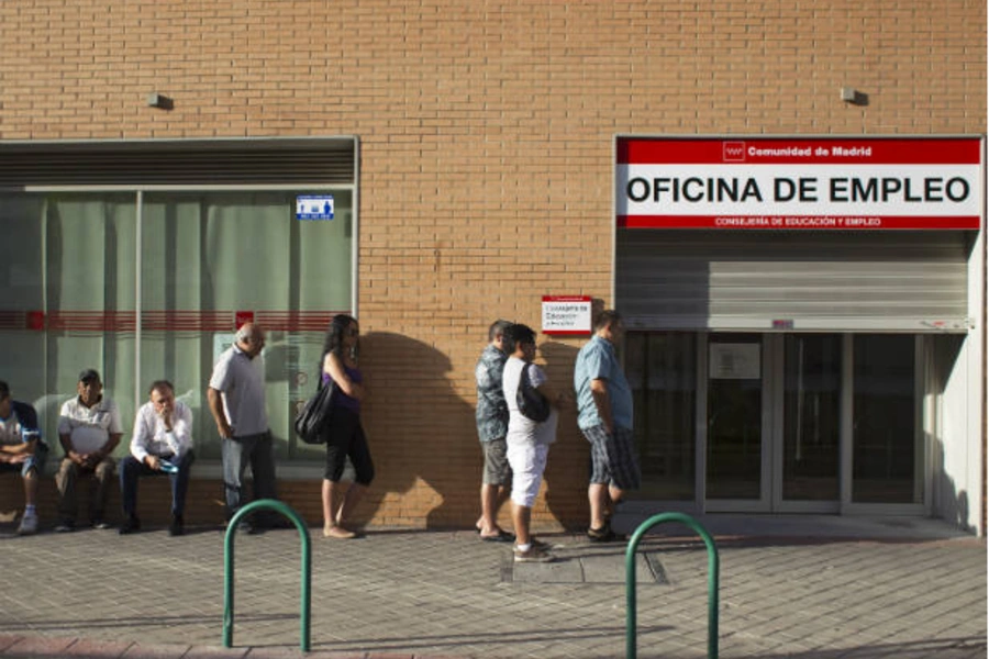 People queue to enter a government-run employment office in Madrid on July 27, 2012 (Juan Medina/Courtesy Reuters).