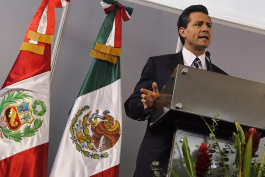 Mexico's president-elect Enrique Pena Nieto talks to the media in Lima, Peru, in September (Mariana Bazo/Courtesy Reuters).