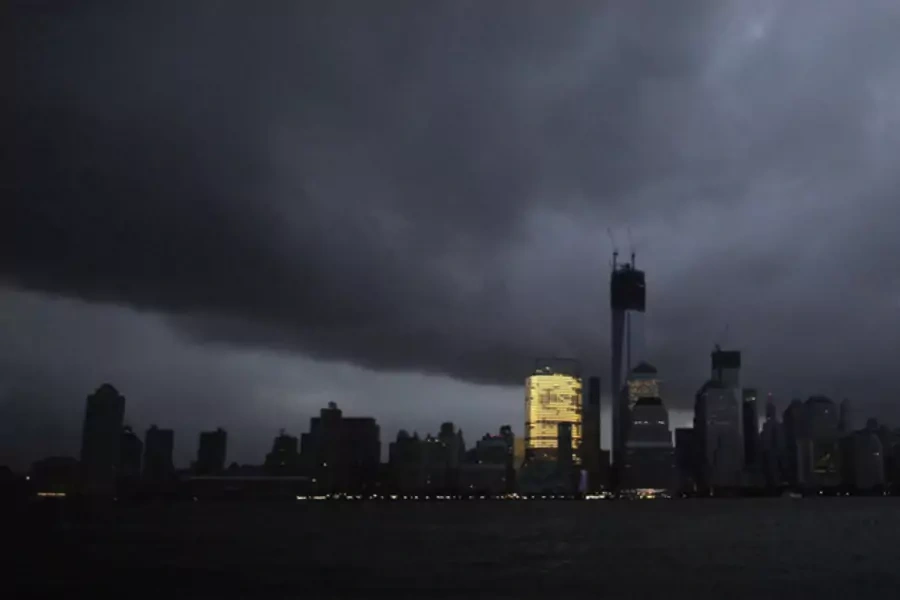 The skyline of lower Manhattan is seen mostly in darkness, except for the Goldman Sachs building, after a preventive power outage caused by Hurricane Sandy on October 30, 2012 (Eduardo Munoz/Courtesy Reuters).