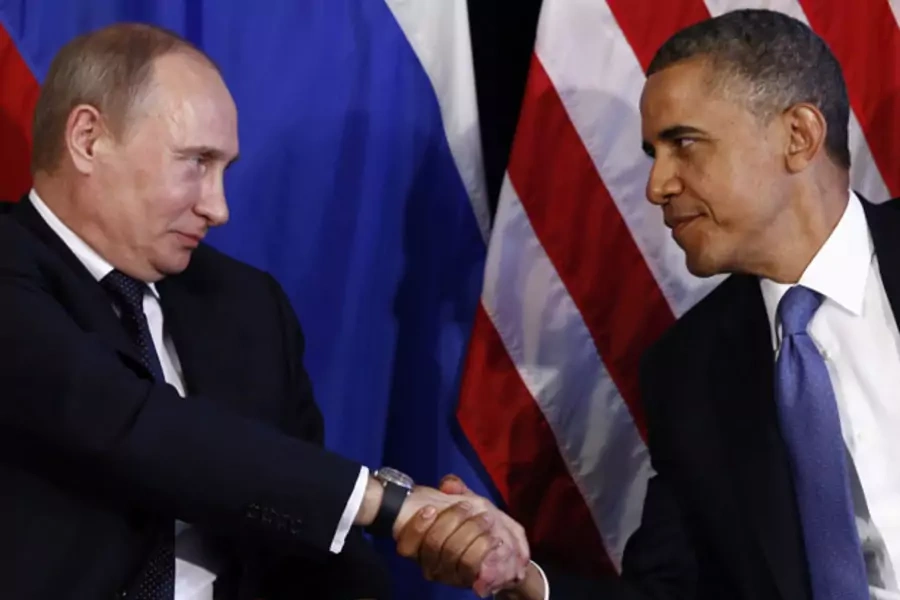 Russian president Vladimir Putin shakes hands with U.S. president Barack Obama during the G20 summit in June 2012 (Jason Reed/Courtesy Reuters).