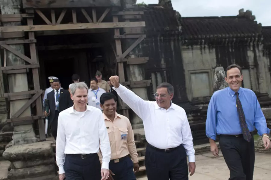 Secretary of Defense Leon Panetta walks alongside U.S. Ambassador to Cambodia William Todd and U.S. Ambassador to ASEAN David Carden as he tours Angkor Wat in Siem Reap, Cambodia November 16, 2012.