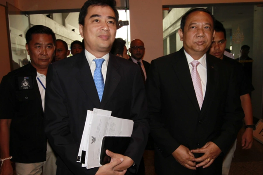 Former Thai prime minister Abhisit Vejjajiva arrives at the Department of Special Investigation (DSI) in Bangkok.