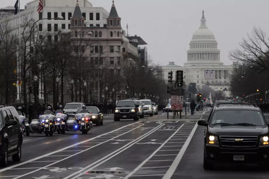 A convoy of vehicles stages a parade rehearsal for Monday's inauguration ceremonies to mark the start of President Barack Obama's second term (Jonathan Ernst/Courtesy Reuters).