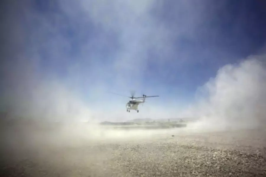 A helicopter lands at Forward Operating Base Apache in the Zabul Province of Afghanistan (Tim Wimborne/Courtesy Reuters).