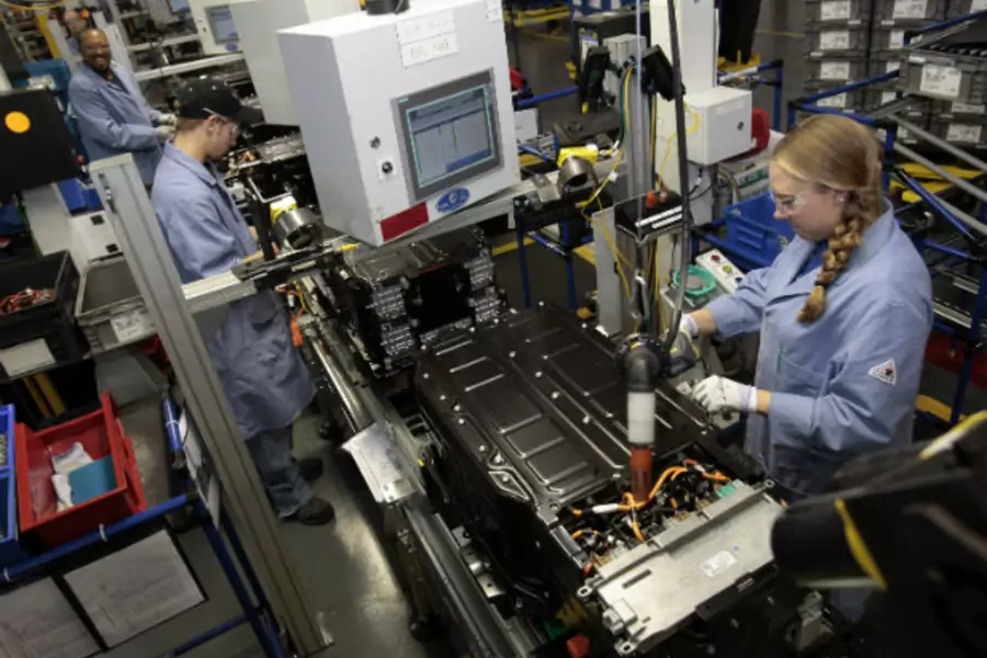 Ford Motor production workers assemble batteries for Ford electric and hybrid vehicles at the Ford Rawsonville Assembly Plant in Ypsilanti Twsp, Michigan (Rebecca Cook/Courtesy Reuters).