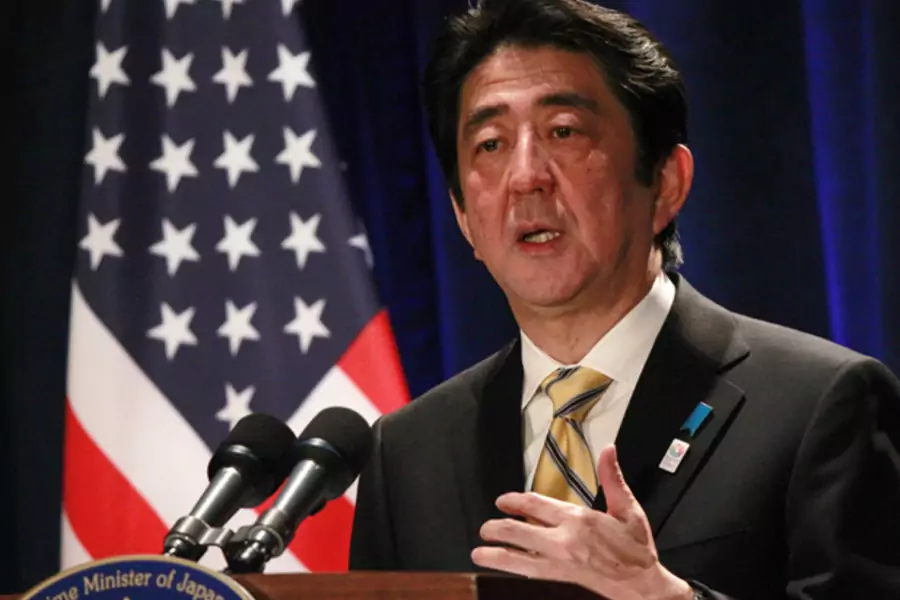 Japan's Prime Minister Shinzo Abe participates in a media conference at a Washington hotel, February 22, 2013