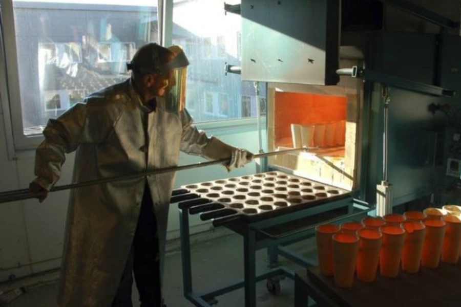 A lab manager at Activation laboratories prepares samples of mines to check ore grades of minerals in Nuuk, Greenland, on October 15, 2012.