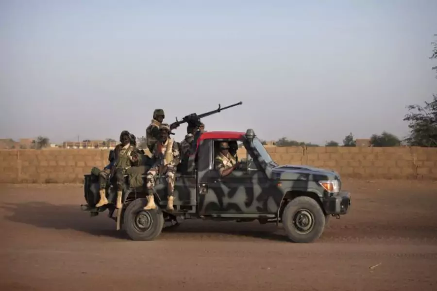 Malian soldiers patrol the streets of Gao on February 20, 2013 (Joe Penney/Courtesy Reuters).