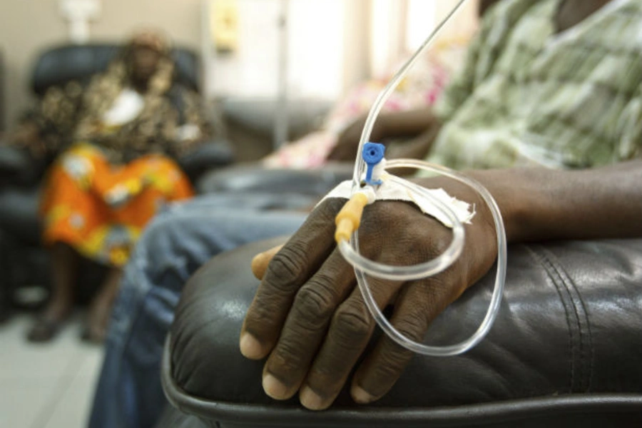 Cancer patients sit in a chemotherapy ward while receiving treatment at the Korle Bu Teaching Hospital in Accra, Ghana on April 24, 2012 (Olivier Asselin/Courtesy Reuters).