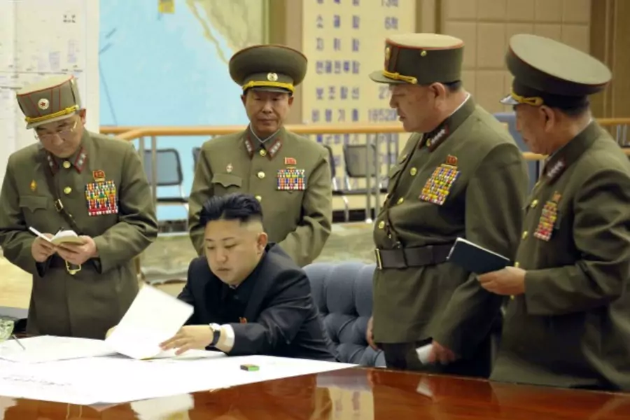 North Korean leader Kim Jong-un presides over an urgent operation meeting on the Korean People's Army Strategic Rocket Force's performance of duty for firepower strike at the Supreme Command in Pyongyang on March 29, 2013. (Courtesy Reuters/KCNA)