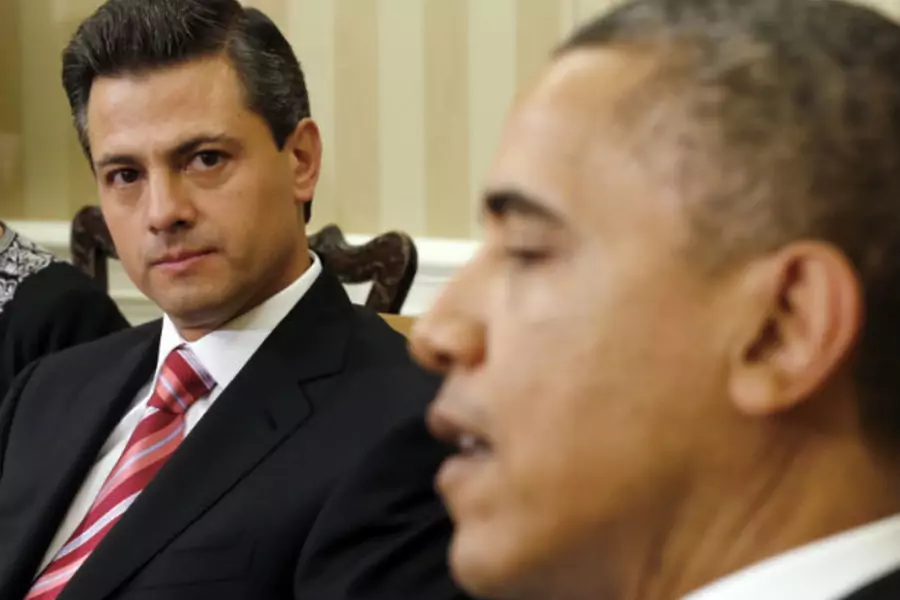 Mexico's President-elect Enrique Pena Nieto listens to U.S. President Barack Obama (R) in the Oval Office of the White House in Washington November 27, 2012 (Kevin Lamarque/Courtesy Reuters).