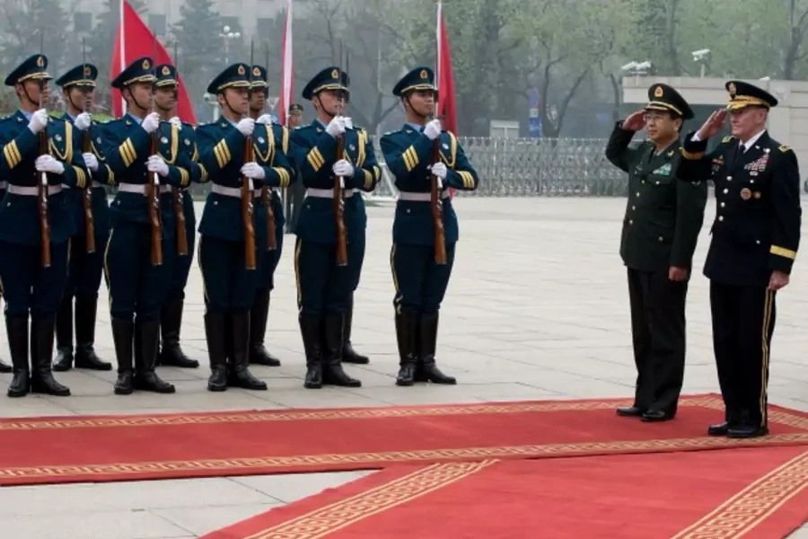 U.S. Joint Chiefs Chairman General Martin Dempsey (R) and Chief of the general staff of China's People's Liberation Army Fang ...g a guard of honor during a welcoming ceremony at the Bayi Building in Beijing on April 22, 2013. (Andy Wong/Courtesy Reuters)